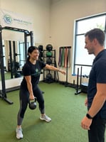 Patient working with a provider at a performance physical therapy clinic in Shirley, MA